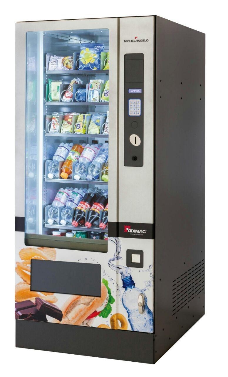 Makeena combo vending machine stocked with chocolate bars, chips and cold drinks